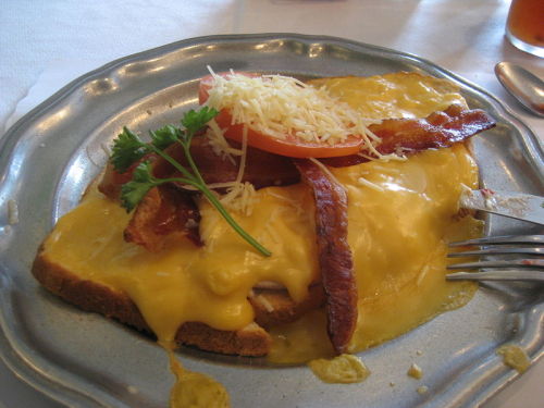 Kentucky Hot Brown A baked open-faced turkey sandwich with ham, bacon, and covered in Mornay sauce. (submitted by Holly via wikipedia)